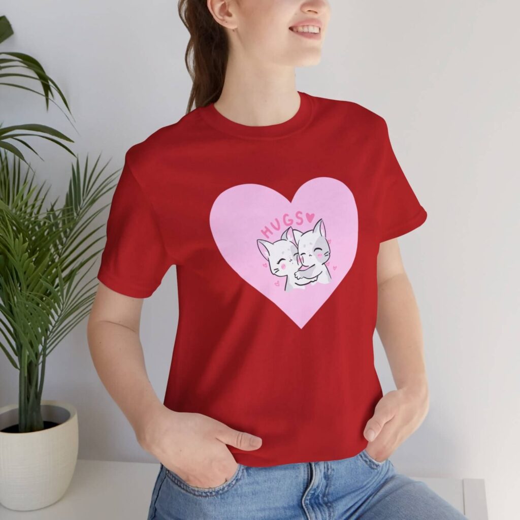 Bring your marketing ideas to life A custom red t-shirt with a cat-themed Valentine’s Day print in front.